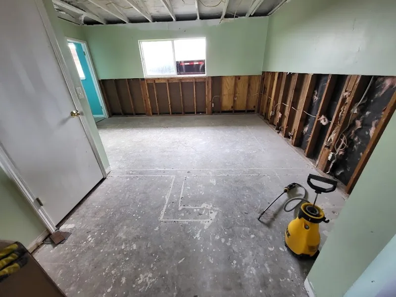 Opened lower walls and exposed framing in Raven's restoration portfolio